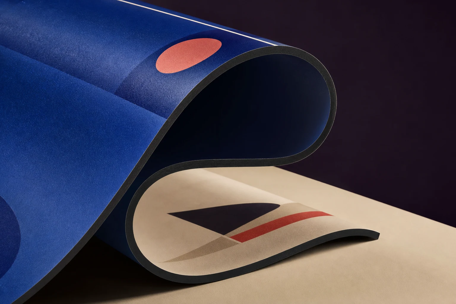 Curved double-sided PVC blockout banner showing both printed faces and its opaque core