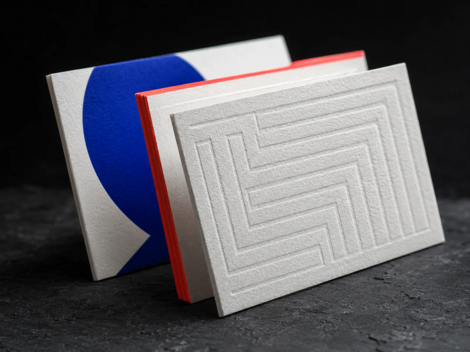 Thick business cards with foil details and cobalt edge colour